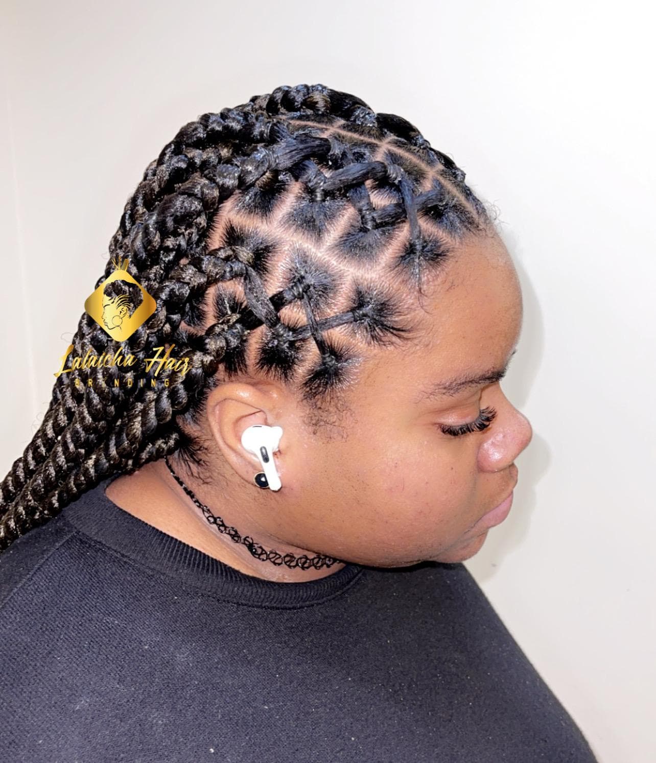 Braided hairstyle by Lalaicha African Hair Braiding